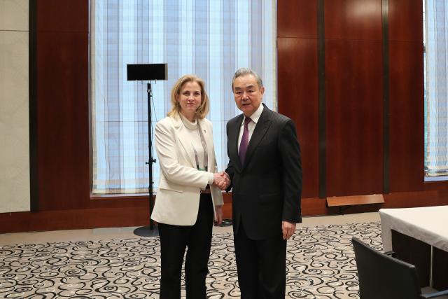 (260213) -- MUNICH, Feb. 13, 2026 (Xinhua) -- Chinese Foreign Minister Wang Yi, also a member of the Political Bureau of the Communist Party of China Central Committee, meets with Austrian Federal Minister for European and International Affairs Beate Meinl-Reisinger on the sidelines of the Munich Security Conference in Munich, Germany, Feb. 13, 2026. (Xinhua/Du Zheyu)
