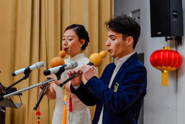 (260214) -- BAKU, Feb. 14, 2026 (Xinhua) -- A teacher and a student from the Confucius Institute at Azerbaijan University of Languages perform during an event to celebrate the upcoming Chinese New Year in Baku, Azerbaijan, Feb. 13, 2026. (Xinhua/Chen Junfeng)