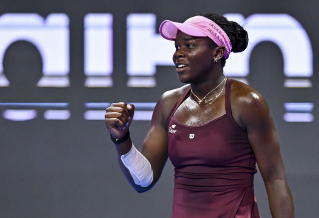 (260214) -- DOHA, Feb. 14, 2026 (Xinhua) -- Victoria Mboko of Canada celebrates scoring during the women's singles semi-final match between Jelena Ostapenko of Latvia and Victoria Mboko of Canada at the WTA Qatar Open 2026 tennis tournament in Doha, Qatar, on Feb. 13, 2026. (Photo by Nikku/Xinhua)