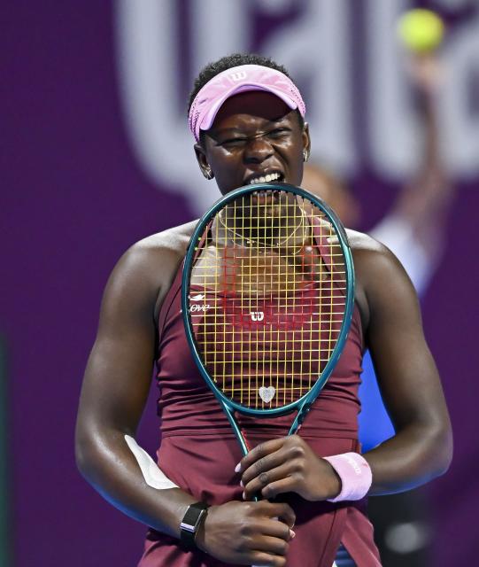 (260214) -- DOHA, Feb. 14, 2026 (Xinhua) -- Victoria Mboko of Canada reacts during the women's singles semi-final match between Jelena Ostapenko of Latvia and Victoria Mboko of Canada at the WTA Qatar Open 2026 tennis tournament in Doha, Qatar, on Feb. 13, 2026. (Photo by Nikku/Xinhua)