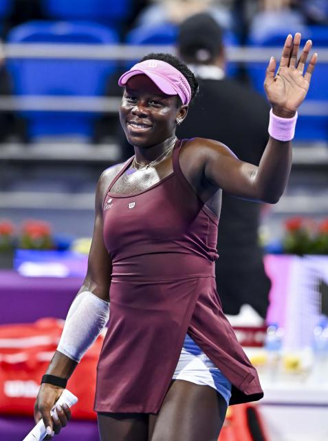 (260214) -- DOHA, Feb. 14, 2026 (Xinhua) -- Victoria Mboko of Canada celebrates after the women's singles semi-final match between Jelena Ostapenko of Latvia and Victoria Mboko of Canada at the WTA Qatar Open 2026 tennis tournament in Doha, Qatar, on Feb. 13, 2026. (Photo by Nikku/Xinhua)