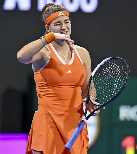 (260214) -- DOHA, Feb. 14, 2026 (Xinhua) -- Karolina Muchova of the Czech Republic reacts during the women's singles semi-final match between Karolina Muchova of the Czech Republic and Maria Sakkari of Greece at the WTA Qatar Open 2026 tennis tournament in Doha, Qatar, on Feb. 13, 2026. (Photo by Nikku/Xinhua)