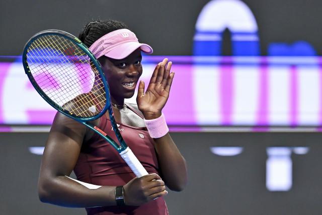 (260214) -- DOHA, Feb. 14, 2026 (Xinhua) -- Victoria Mboko of Canada reacts during the women's singles semi-final match between Jelena Ostapenko of Latvia and Victoria Mboko of Canada at the WTA Qatar Open 2026 tennis tournament in Doha, Qatar, on Feb. 13, 2026. (Photo by Nikku/Xinhua)