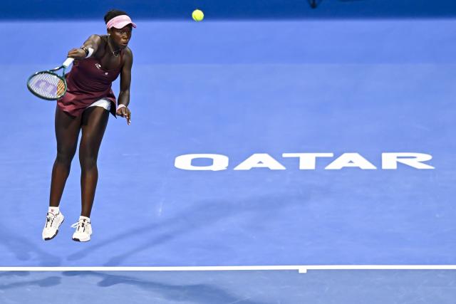 (260214) -- DOHA, Feb. 14, 2026 (Xinhua) -- Victoria Mboko of Canada serves during the women's singles semi-final match between Jelena Ostapenko of Latvia and Victoria Mboko of Canada at the WTA Qatar Open 2026 tennis tournament in Doha, Qatar, on Feb. 13, 2026. (Photo by Nikku/Xinhua)