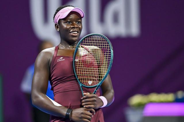 (260214) -- DOHA, Feb. 14, 2026 (Xinhua) -- Victoria Mboko of Canada reacts during the women's singles semi-final match between Jelena Ostapenko of Latvia and Victoria Mboko of Canada at the WTA Qatar Open 2026 tennis tournament in Doha, Qatar, on Feb. 13, 2026. (Photo by Nikku/Xinhua)