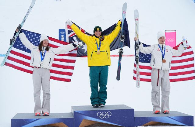 (260214) -- LIVIGNO, Feb. 14, 2026 (Xinhua) -- Gold medalist Jakara Anthony (C) of Australia, silver medalist Jaelin Kauf (L) of the United States and bronze medalist Elizabeth Lemley of the United States pose for photos during the awarding ceremony for the freestyle skiing women's dual moguls at the Milan-Cortina 2026 Olympic Winter Games in Livigno, Italy, Feb. 14, 2026. (Xinhua/Wu Huiwo)