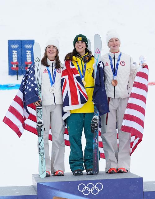 (260214) -- LIVIGNO, Feb. 14, 2026 (Xinhua) -- Gold medalist Jakara Anthony (C) of Australia, silver medalist Jaelin Kauf (L) of the United States and bronze medalist Elizabeth Lemley of the United States pose for photos during the awarding ceremony for the freestyle skiing women's dual moguls at the Milan-Cortina 2026 Olympic Winter Games in Livigno, Italy, Feb. 14, 2026. (Xinhua/Wu Huiwo)