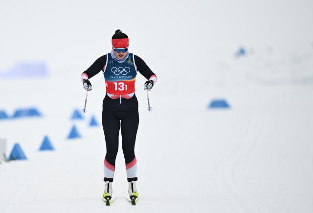 (260214) -- TESERO, Feb. 14, 2026 (Xinhua) -- China's Dinigeer Yilamujiang competes during the cross-country skiing women's 4x7.5km relay match at the Milan-Cortina 2026 Olympic Winter Games in Tesero, Italy, Feb. 14, 2026. (Xinhua/He Canling)