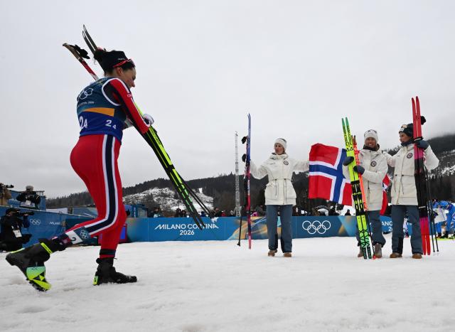 (260214) -- TESERO, Feb. 14, 2026 (Xinhua) -- Athletes of Norway celebrate after the cross-country skiing women's 4x7.5km relay match at the Milan-Cortina 2026 Olympic Winter Games in Tesero, Italy, Feb. 14, 2026. (Xinhua/He Canling)