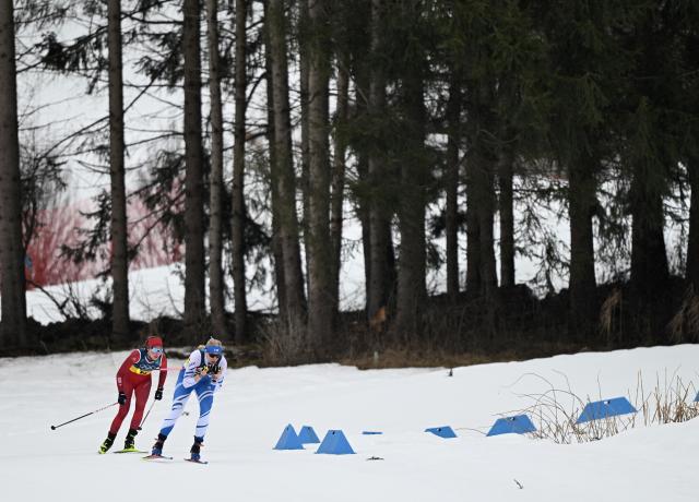 (260214) -- TESERO, Feb. 14, 2026 (Xinhua) -- Athletes compete during the cross-country skiing women's 4x7.5km relay match at the Milan-Cortina 2026 Olympic Winter Games in Tesero, Italy, Feb. 14, 2026. (Xinhua/He Canling)