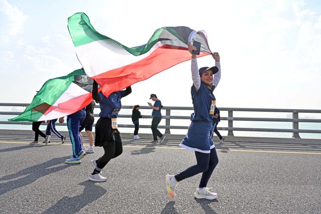 (260214) -- KUWAIT CITY, Feb. 14, 2026 (Xinhua) -- People participate in the Sports Day event in Kuwait City, Kuwait, Feb. 14, 2026. (Photo by Asad/Xinhua)