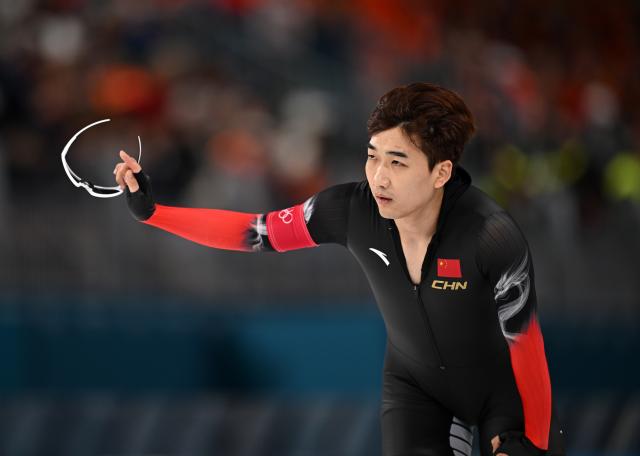(260214) -- MILAN, Feb. 14, 2026 (Xinhua) -- Gao Tingyu of China reacts after the speed skating men's 500m match at the Milan-Cortina 2026 Olympic Winter Games in Milan, Italy, Feb. 14, 2026. (Xinhua/Wu Wei)