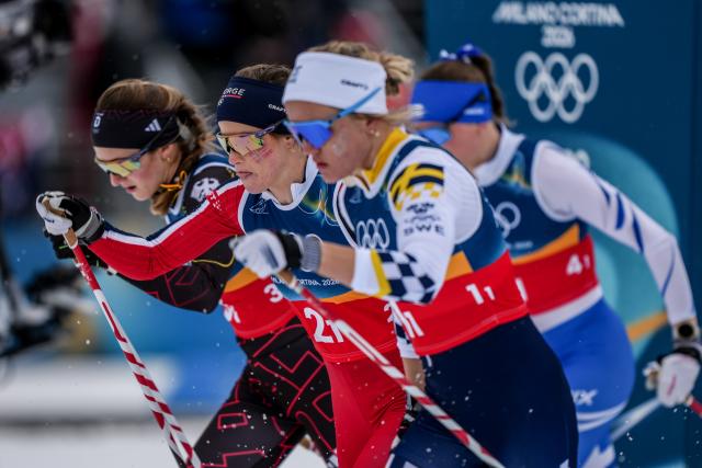 (260214) -- TESERO, Feb. 14, 2026 (Xinhua) -- Athletes compete during the cross-country skiing women's 4x7.5km relay match at the Milan-Cortina 2026 Olympic Winter Games in Tesero, Italy, Feb. 14, 2026. (Xinhua/Peng Ziyang)
