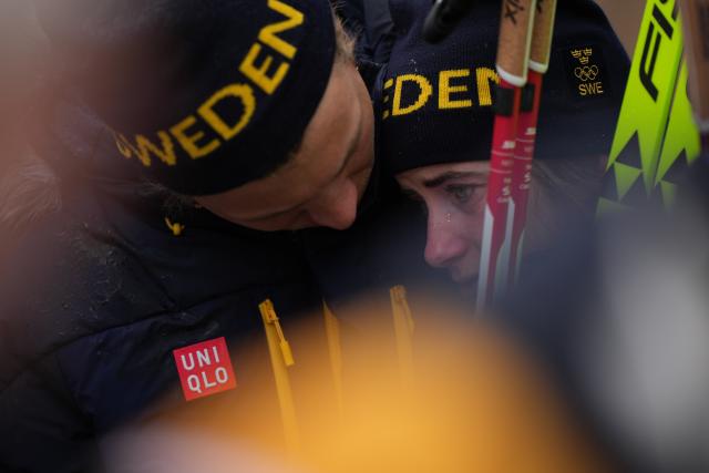 (260214) -- TESERO, Feb. 14, 2026 (Xinhua) -- Ebba Andersson of Sweden reacts after the cross-country skiing women's 4x7.5km relay match at the Milan-Cortina 2026 Olympic Winter Games in Tesero, Italy, Feb. 14, 2026. (Xinhua/Peng Ziyang)