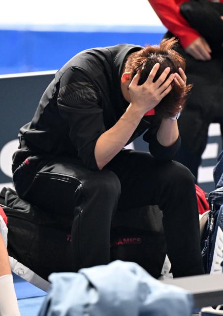(260214) -- MILAN, Feb. 14, 2026 (Xinhua) -- Gao Tingyu of China reacts after the speed skating men's 500m final at the Milan-Cortina 2026 Olympic Winter Games in Milan, Italy, Feb. 14, 2026. (Xinhua/Wu Wei)