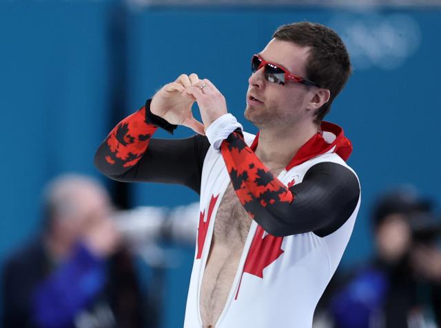 (260214) -- MILAN, Feb. 14, 2026 (Xinhua) -- Laurent Dubreuil of Canada gestures after the speed skating men's 500m final at the Milan-Cortina 2026 Olympic Winter Games in Milan, Italy, Feb. 14, 2026. (Xinhua/Du Xiaoyi)