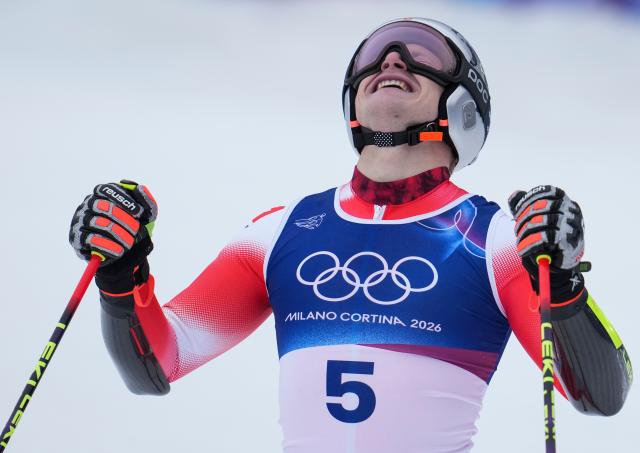(260214) -- BORMIO, Feb. 14, 2026 (Xinhua) -- Marco Odermatt of Switzerland reacts after the alpine skiing men's giant slalom run 2 at the Milan-Cortina 2026 Olympic Winter Games in Bormio, Italy, Feb. 14, 2026. (Xinhua/Hu Huhu)
