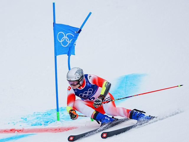 (260214) -- BORMIO, Feb. 14, 2026 (Xinhua) -- Marco Odermatt of Switzerland competes during the alpine skiing men's giant slalom run 2 at the Milan-Cortina 2026 Olympic Winter Games in Bormio, Italy, Feb. 14, 2026. (Xinhua/Yan Linyun)