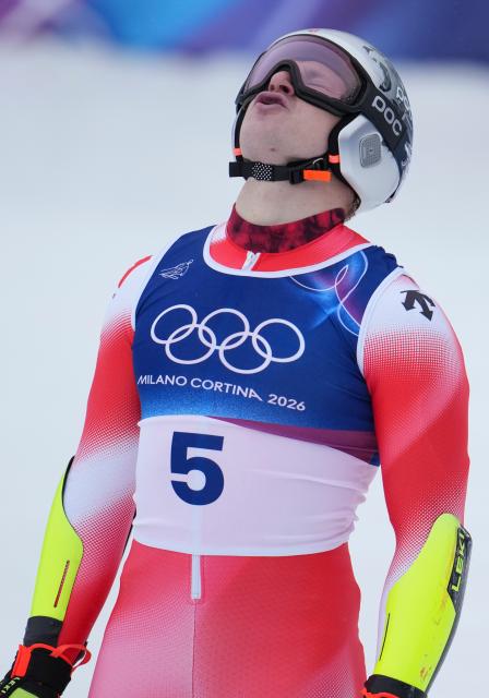 (260214) -- BORMIO, Feb. 14, 2026 (Xinhua) -- Marco Odermatt of Switzerland reacts after the alpine skiing men's giant slalom run 2 at the Milan-Cortina 2026 Olympic Winter Games in Bormio, Italy, Feb. 14, 2026. (Xinhua/Hu Huhu)