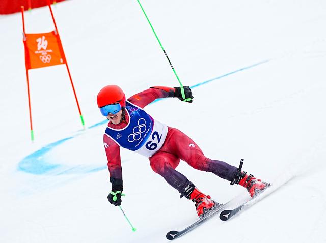 (260214) -- BORMIO, Feb. 14, 2026 (Xinhua) -- Liu Xiaochen of China reacts after the alpine skiing men's giant slalom run 2 at the Milan-Cortina 2026 Olympic Winter Games in Bormio, Italy, Feb. 14, 2026. (Xinhua/Yan Linyun)