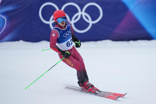 (260214) -- BORMIO, Feb. 14, 2026 (Xinhua) -- Liu Xiaochen of China reacts after the alpine skiing men's giant slalom run 2 at the Milan-Cortina 2026 Olympic Winter Games in Bormio, Italy, Feb. 14, 2026. (Xinhua/Hu Huhu)