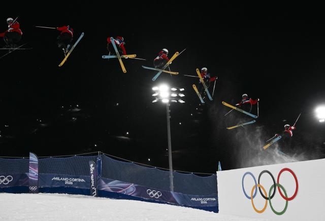 (260214) -- LIVIGNO, Feb. 14, 2026 (Xinhua) -- This multi-exposure photo shows Yang Ruyi of China competing during the free skiing women's freeski big air qualification at the Milan-Cortina 2026 Olympic Winter Games in Livigno, Italy, Feb. 14, 2026. (Xinhua/Xia Yifang)