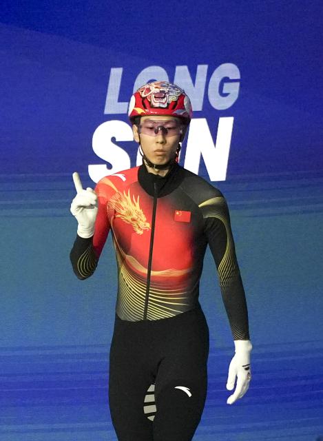 (260214) -- MILAN, Feb. 14, 2026 (Xinhua) -- Sun Long of China arrives for the short track speed skating men's 1500m final A at the Milan-Cortina 2026 Olympic Winter Games in Milan, Italy, Feb. 14, 2026. (Xinhua/Xue Yuge)