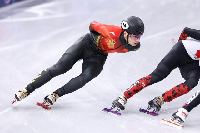 (260214) -- MILAN, Feb. 14, 2026 (Xinhua) -- Liu Shaoang of China competes during the short track speed skating men's 1500m final A at the Milan-Cortina 2026 Olympic Winter Games in Milan, Italy, Feb. 14, 2026. (Xinhua/Chen Yichen)