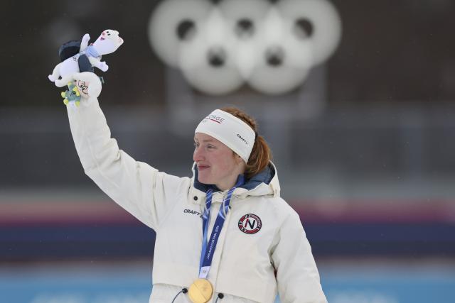 (260214) -- ANTERSELVA, Feb. 14, 2026 (Xinhua) -- Gold medalist Maren Kirkeeide of Norway celebrates during the awarding ceremony of the biathlon women's 7.5km sprint event at the Milan-Cortina 2026 Olympic Winter Games in Anterselva, Italy, Feb. 14, 2026. (Xinhua/Zhang Tao)
