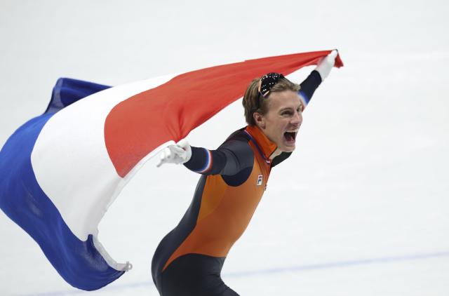 (260214) -- MILAN, Feb. 14, 2026 (Xinhua) -- Jens van 'T Wout of the Netherlands celebrates after the short track speed skating men's 1500m final A at the Milan-Cortina 2026 Olympic Winter Games in Milan, Italy, Feb. 14, 2026. (Xinhua/Li Ming)