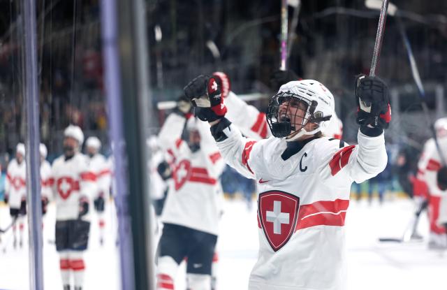 (260215) -- MILAN, Feb. 15, 2026 (Xinhua) -- Lara Stalder of Switzerland reacts after the ice hockey women's play-offs quarterfinal between Finland and Switzerland at the Milan-Cortina 2026 Olympic Winter Games in Milan, Italy, Feb. 14, 2026. (Xinhua/Wang Kaiyan)