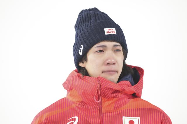 (260215) -- PREDAZZO, Feb. 15, 2026 (Xinhua) -- Silver medalist Nikaido Ren of Japan reacts during the awarding ceremony for the ski jumping men's large hill individual event at the Milan-Cortina 2026 Olympic Winter Games in Predazzo, Italy, Feb. 14, 2026. (Xinhua/Huang Wei)