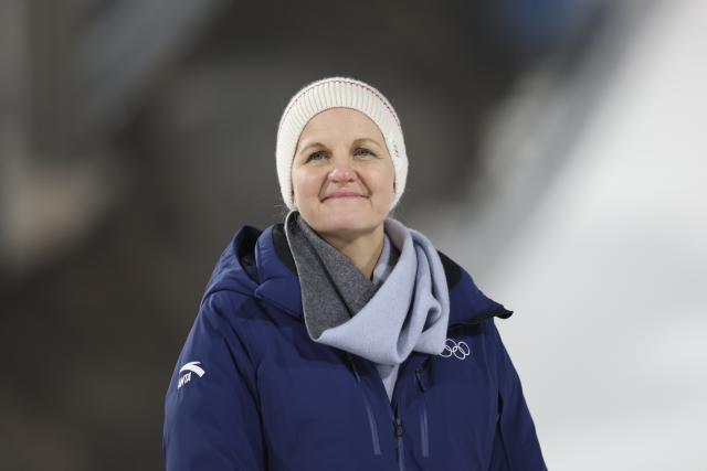 (260215) -- PREDAZZO, Feb. 15, 2026 (Xinhua) -- International Olympic Committee (IOC) President Kirsty Coventry is seen during the awarding ceremony for the ski jumping men's large hill individual event at the Milan-Cortina 2026 Olympic Winter Games in Predazzo, Italy, Feb. 14, 2026. (Xinhua/Huang Wei)