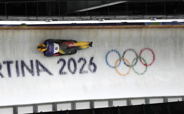 (260215) -- CORTINA D'AMPEZZO, Feb. 15, 2026 (Xinhua) -- Jacqueline Pfeifer of Germany competes during the skeleton women's heat at the Milan-Cortina 2026 Olympic Winter Games in Cortina, Italy, Feb. 14, 2026. (Xinhua/Li Gang)