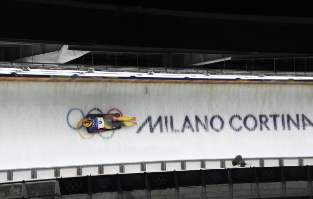 (260215) -- CORTINA D'AMPEZZO, Feb. 15, 2026 (Xinhua) -- Susanne Kreher of Germany competes during the skeleton women's heat at the Milan-Cortina 2026 Olympic Winter Games in Cortina, Italy, Feb. 14, 2026. (Xinhua/Li Gang)