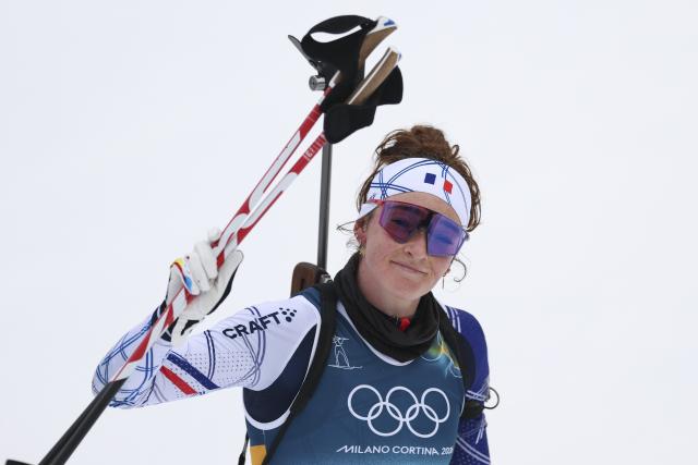 (260215) -- ANTERSELVA, Feb. 15, 2026 (Xinhua) -- Bronze medalist Lou Jeanmonnot of France reacts after crossing the finish line during the biathlon women's 7.5km sprint event at the Milan-Cortina 2026 Olympic Winter Games in Anterselva, Italy, Feb. 14, 2026. (Xinhua/Zhang Tao)