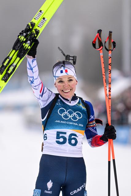 (260215) -- ANTERSELVA, Feb. 15, 2026 (Xinhua) -- Silver medalist Oceane Michelon of France celebrates after the biathlon women's 7.5km sprint event at the Milan-Cortina 2026 Olympic Winter Games in Anterselva, Italy, Feb. 14, 2026. (Xinhua/Jiang Han)
