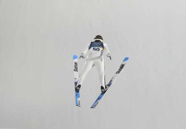 (260215) -- PREDAZZO, Feb. 15, 2026 (Xinhua) -- Domen Prevc of Slovenia competes during the trial round of ski jumping men's large hill individual event at the Milan-Cortina 2026 Olympic Winter Games in Predazzo, Italy, Feb. 14, 2026. (Xinhua/Huang Wei)