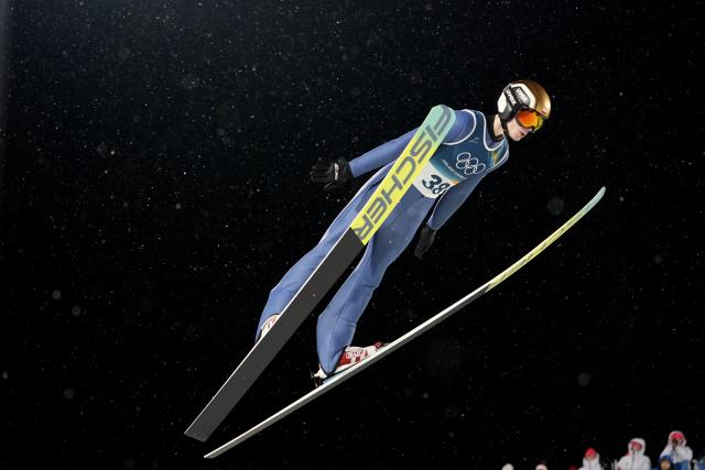 (260215) -- PREDAZZO, Feb. 15, 2026 (Xinhua) -- Kacper Tomasiak of Poland competes during the trial round of ski jumping men's large hill individual event at the Milan-Cortina 2026 Olympic Winter Games in Predazzo, Italy, Feb. 14, 2026. (Xinhua/Meng Yongmin)