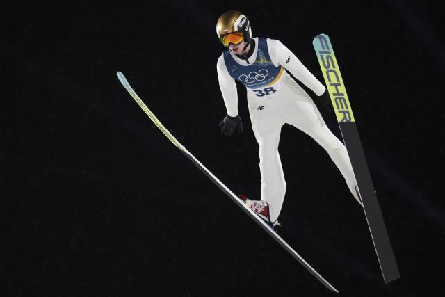 (260215) -- PREDAZZO, Feb. 15, 2026 (Xinhua) -- Kacper Tomasiak of Poland competes during the 1st round of ski jumping men's large hill individual event at the Milan-Cortina 2026 Olympic Winter Games in Predazzo, Italy, Feb. 14, 2026. (Xinhua/Huang Wei)