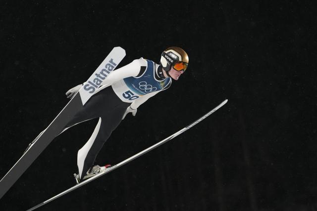 (260215) -- PREDAZZO, Feb. 15, 2026 (Xinhua) -- Domen Prevc of Slovenia competes during the 1st round of ski jumping men's large hill individual event at the Milan-Cortina 2026 Olympic Winter Games in Predazzo, Italy, Feb. 14, 2026. (Xinhua/Meng Yongmin)