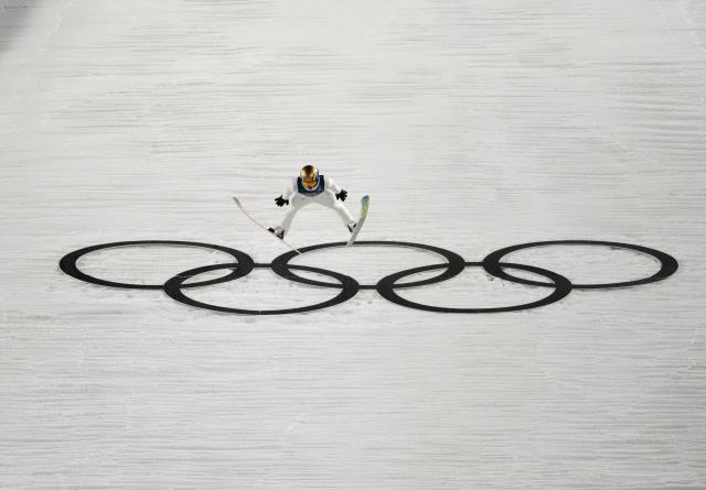(260215) -- PREDAZZO, Feb. 15, 2026 (Xinhua) -- Kacper Tomasiak of Poland competes during the final round of ski jumping men's large hill individual event at the Milan-Cortina 2026 Olympic Winter Games in Predazzo, Italy, Feb. 14, 2026. (Xinhua/Huang Wei)