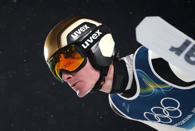 (260215) -- PREDAZZO, Feb. 15, 2026 (Xinhua) -- Domen Prevc of Slovenia competes during the 1st round of ski jumping men's large hill individual event at the Milan-Cortina 2026 Olympic Winter Games in Predazzo, Italy, Feb. 14, 2026. (Xinhua/Huang Wei)