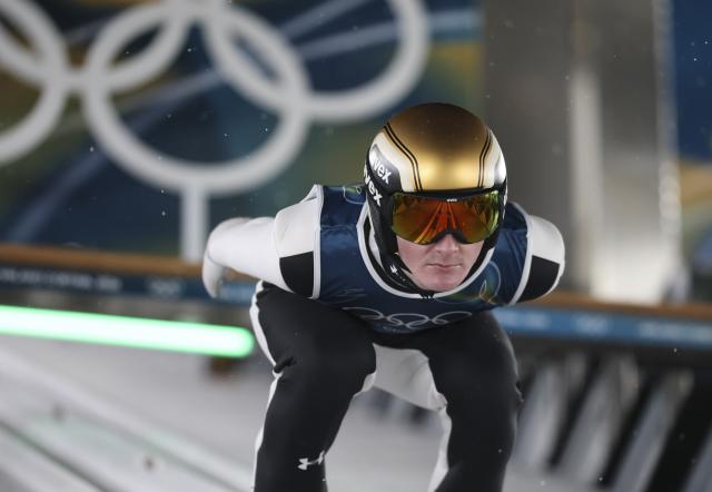 (260215) -- PREDAZZO, Feb. 15, 2026 (Xinhua) -- Domen Prevc of Slovenia competes during the 1st round of ski jumping men's large hill individual event at the Milan-Cortina 2026 Olympic Winter Games in Predazzo, Italy, Feb. 14, 2026. (Xinhua/Huang Wei)