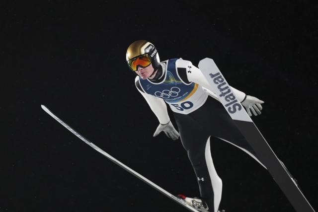 (260215) -- PREDAZZO, Feb. 15, 2026 (Xinhua) -- Domen Prevc of Slovenia competes during the 1st round of ski jumping men's large hill individual event at the Milan-Cortina 2026 Olympic Winter Games in Predazzo, Italy, Feb. 14, 2026. (Xinhua/Huang Wei)