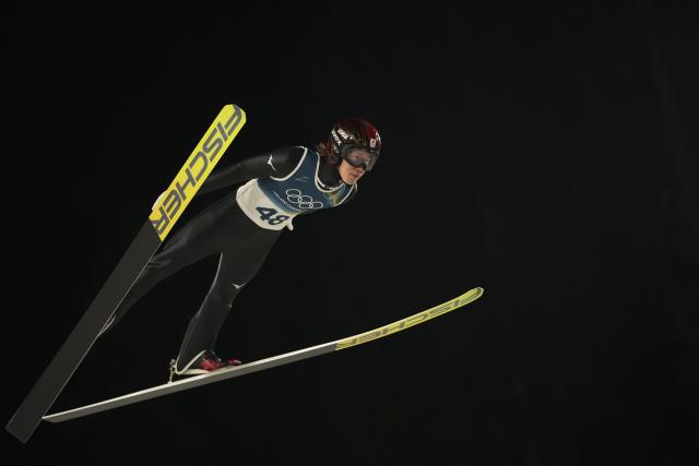 (260215) -- PREDAZZO, Feb. 15, 2026 (Xinhua) -- Nikaido Ren of Japan competes during the final round of ski jumping men's large hill individual event at the Milan-Cortina 2026 Olympic Winter Games in Predazzo, Italy, Feb. 14, 2026. (Xinhua/Meng Yongmin)
