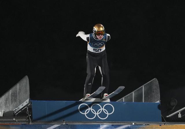 (260215) -- PREDAZZO, Feb. 15, 2026 (Xinhua) -- Domen Prevc of Slovenia competes during the 1st round of ski jumping men's large hill individual event at the Milan-Cortina 2026 Olympic Winter Games in Predazzo, Italy, Feb. 14, 2026. (Xinhua/Meng Yongmin)
