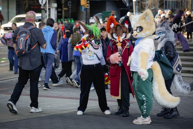 (260215) -- VANCOUVER, Feb. 15, 2026 (Xinhua) -- Participants in cosplay costumes are seen during the Fan Expo 2026 in Vancouver, Canada, on Feb. 14, 2026. As one of the largest pop-culture fan conventions and comics, sci-fi, anime and gaming expos in Canada, the annual event kicked off here on Saturday and will run until Feb. 16. (Photo by Liang Sen/Xinhua)