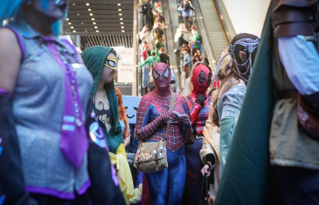 (260215) -- VANCOUVER, Feb. 15, 2026 (Xinhua) -- Participants in cosplay costumes are seen during the Fan Expo 2026 in Vancouver, Canada, on Feb. 14, 2026. As one of the largest pop-culture fan conventions and comics, sci-fi, anime and gaming expos in Canada, the annual event kicked off here on Saturday and will run until Feb. 16. (Photo by Liang Sen/Xinhua)