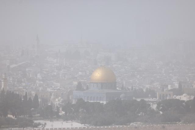 (260215) -- JERUSALEM, Feb. 15, 2026 (Xinhua) -- The Old City of Jerusalem is seen during a dust storm on Feb. 14, 2026. (Photo by Jamal Awad/Xinhua)